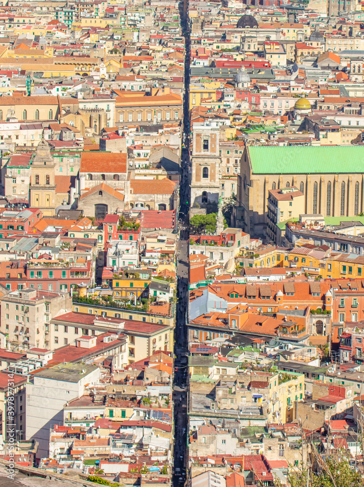 Naples, Italy - a straight and narrow street that traverses the old city, Spaccanapoli (Naples splitter) cuts the city for 2 km. Here in particular Spaccanapoli seen from Vomero Hill