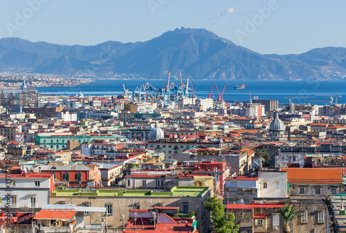 Fototapeta Naklejka Na Ścianę i Meble -  Naples, Italy - probably the most notable landmark in Napoli and potentially an active volcano, Mount Vesuvius stands out on the background of the city