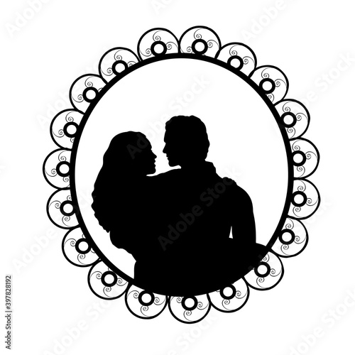 Silhouette in frame of man holding woman in her arms