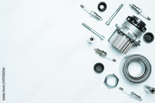 Accessories for cars. Set of new metal car part. Auto motor mechanic spare or automotive piece isolated on white background. Automobile engine service with space for text.