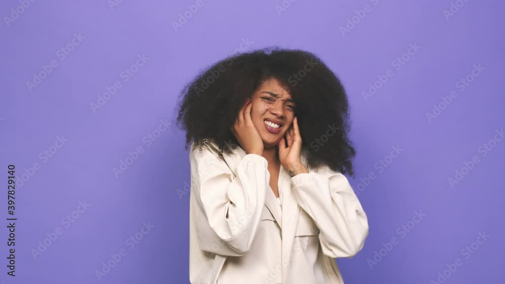 Young african american curly woman showing number two with fingers Young african american curly woman showing number two with fingers