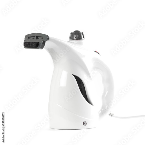White hand held steamer. Close up. Isolated on a white background