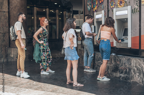 Line to ATM. Group of people waiting to withdraw money to bank card using ATM cash machine. Bank service. Finance, transactions, credit card, money withdraw, currency concept