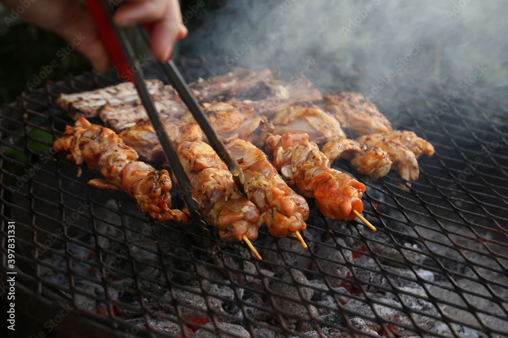 A traditional South African braai. This photo has selective focus. A traditional South African braai. This photo has selective focus.