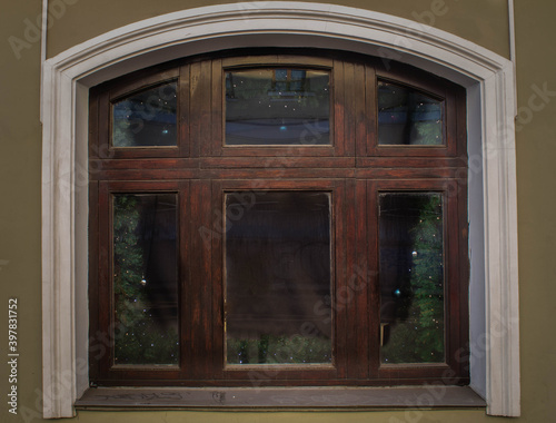 Wooden windows are brown. Combination of architecture and wood window