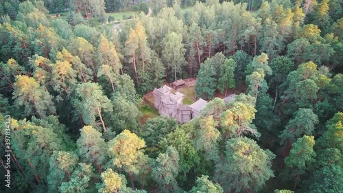 Reconstructed Wooden Castle of Semigallians in Tervete, Latvia Surrounded by Pine Forest. Aerial Dron 4k View. photo