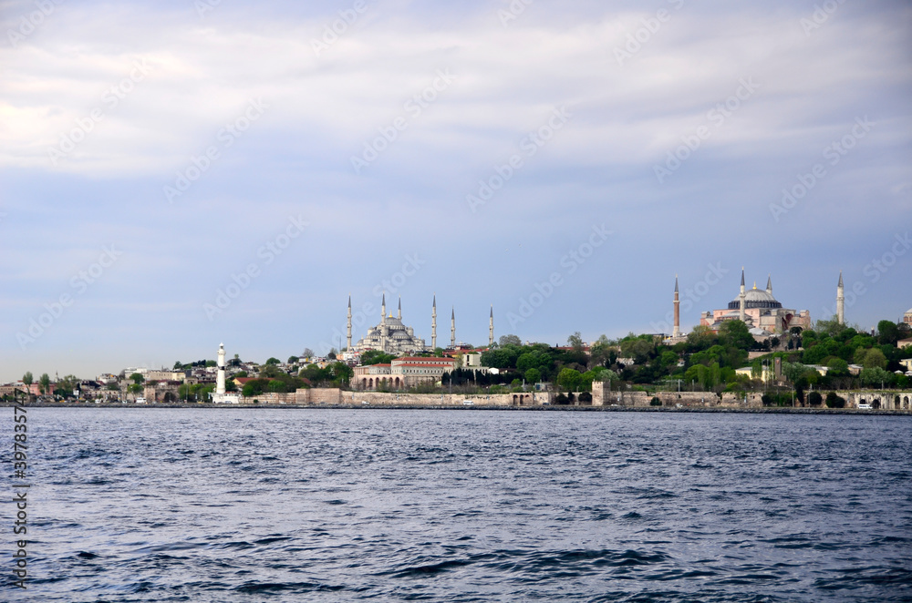 Blue Mosque and Hagia Sophia , are symbols of Istanbul, was shot from boat which was on the sea.