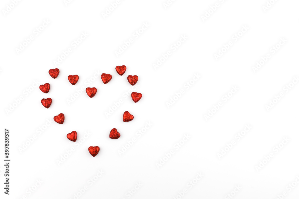 Small red hearts are symbol of Valentine's Day