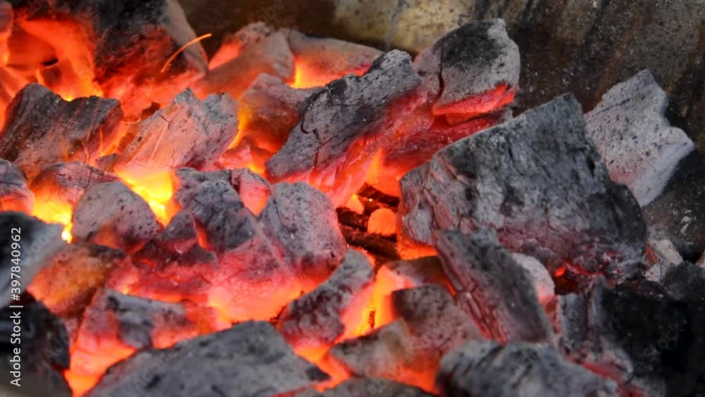 Close up of burning coals with fire Glowing Charcoal Background. bbq grill
embers. Close up of burning coals with fire Glowing Charcoal Background. bbq grill
embers.
