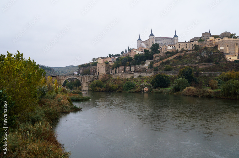 Panorama of Toledo with river and castle, Spain