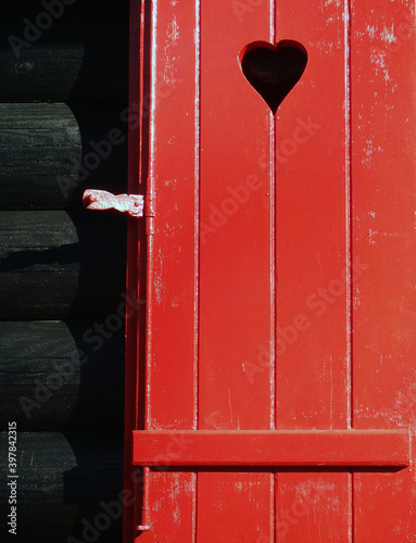 red heart on a wooden window