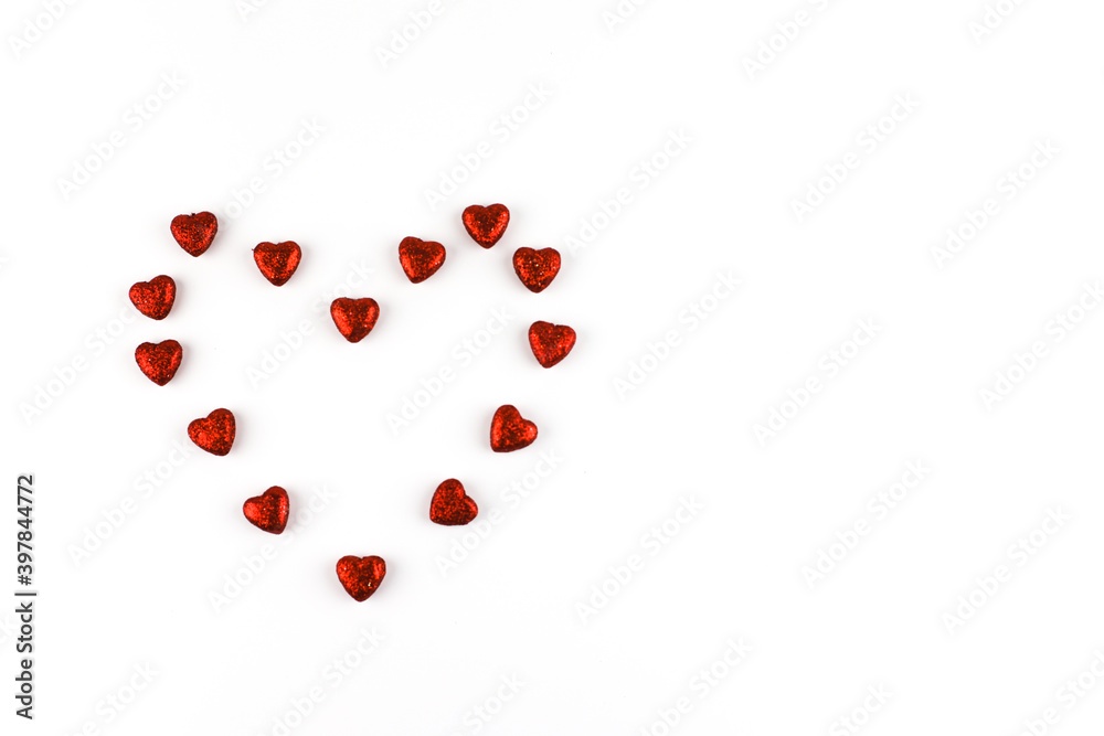 Small red hearts are symbol of Valentine's Day