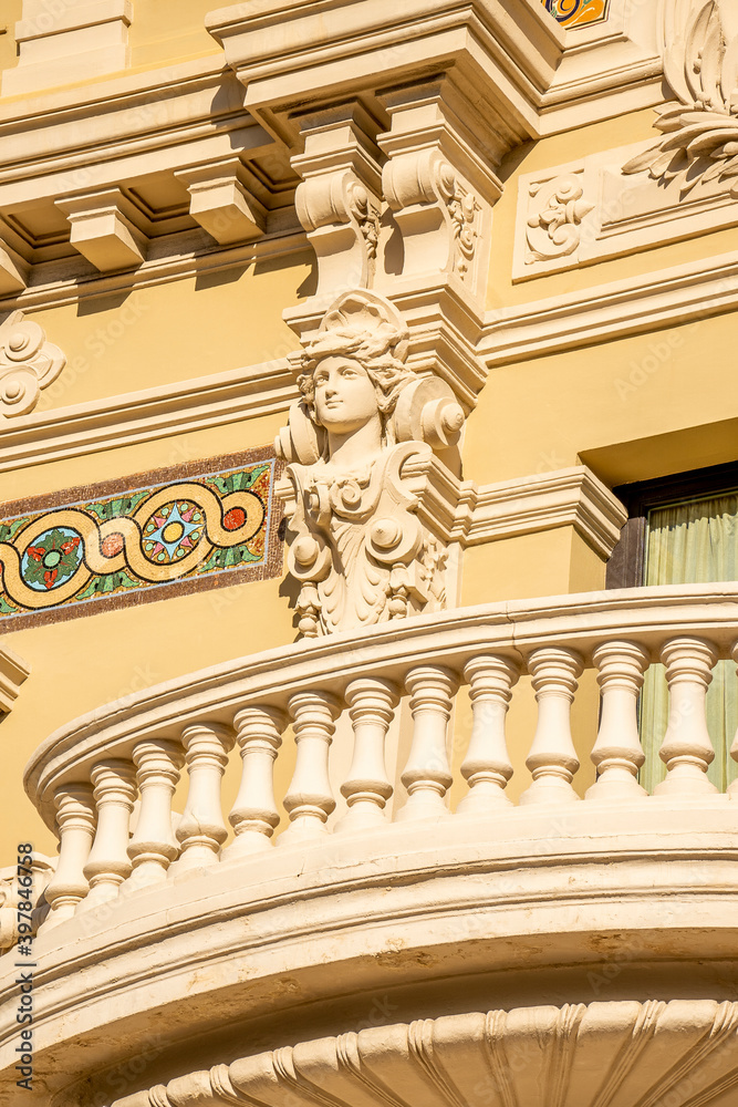 Fototapeta premium MONTE CARLO, MONACO 29.11.2020 Statue on the facade of the Opera in Monte-Carlo. Hight quality photo