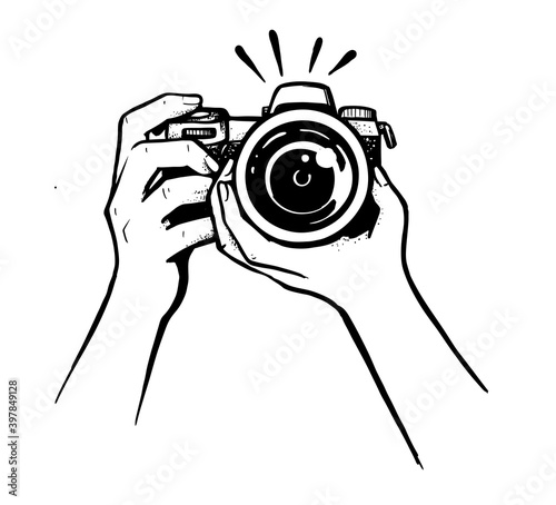 female hand holding camera on white background