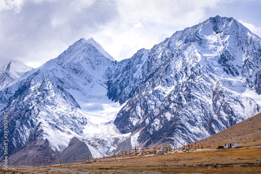 Kunzum Pass at 4,590 m is a high mountain pass on Kunzum Range of the Himalayas connects Lahul valley and Spiti valley. The road connects Kaza from Manali is treacheous journey crossing hair pin bends
