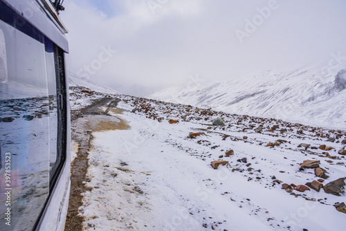 Snow covered beautiful landscape of Chandra river valley in Spiti during winter.  Spiti means 'The Middle Land' is a cold desert mountain valley located high in Himalayas of Himachal Pradesh, India. © anjali04