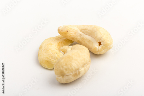 Raw cashew nuts isolated on white background.