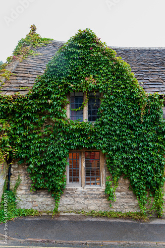 Step back in time and visit Castle Combs, quaint village with well preserved masonry houses dated back to 13 century. Castle Combe, a picturesque medieval village in England. UK.