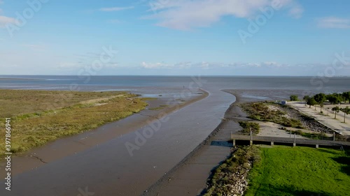 Aerial view of countryside around the the Vasco da Gama bridge in Lisbon, with the view of highways and Tagus river. Top view of the longest bridge in Europe.