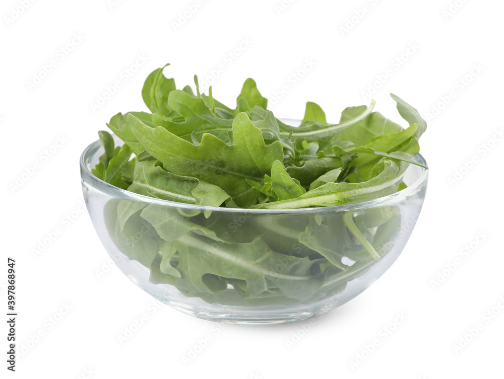 Delicious fresh arugula on glass bowl isolated on white Delicious fresh arugula on glass bowl isolated on white
