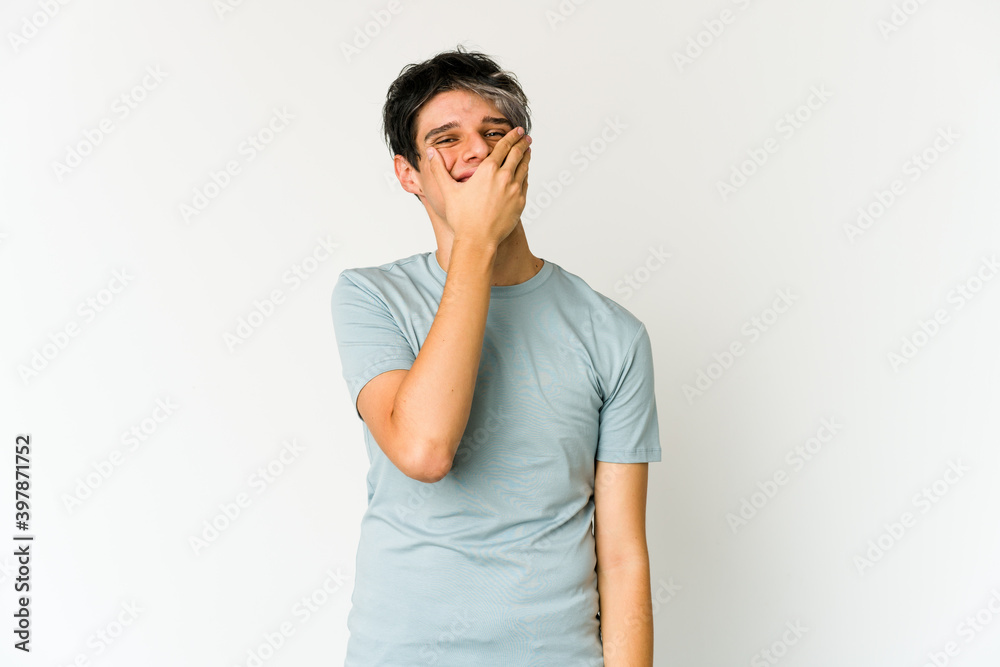 Young skinny hispanic man laughing happy, carefree, natural emotion. Young skinny hispanic man laughing happy, carefree, natural emotion.