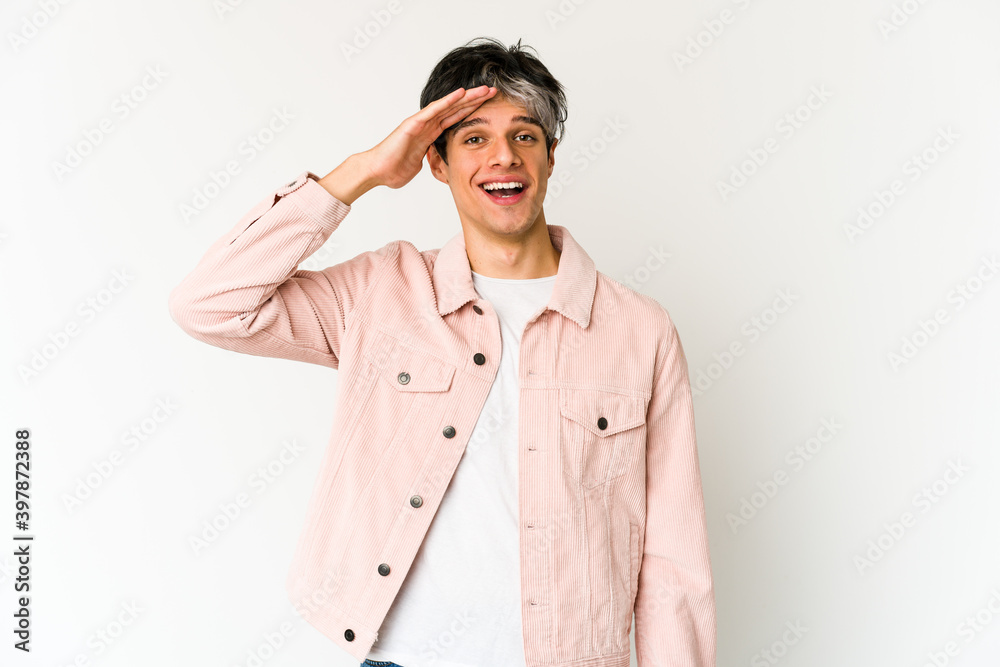 Young skinny hispanic man shouts loud, keeps eyes opened and hands tense. Young skinny hispanic man shouts loud, keeps eyes opened and hands tense.