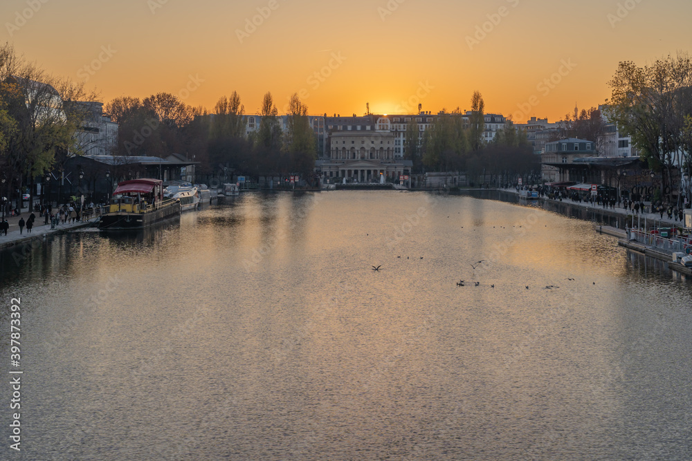 Paris, France - 12 28 2019: View of th Basin of the villette and the The Ledoux rotunda at sunset