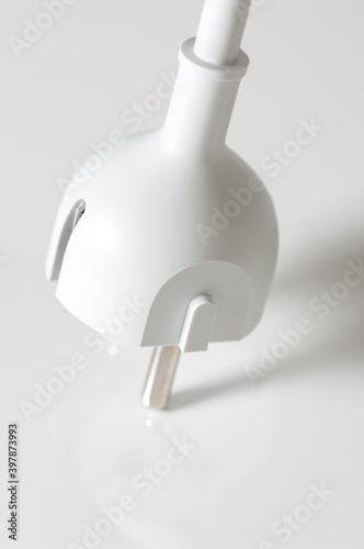 White electric plug cable isolated on white background