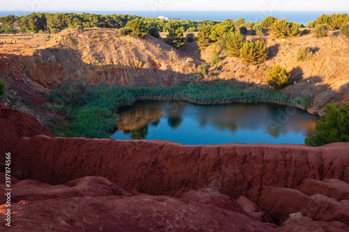 Beautiful view of the lake of former open-pit bauxite mine near Otranto - Apulia, Italy