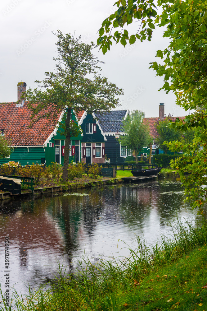 Traditional Dutch house in Zaanse Schans. Small village in Amsterdam, Netherlands. Traditional Dutch house in Zaanse Schans. Small village in Amsterdam, Netherlands.