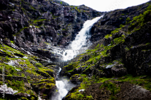 Bridge over a waterfall on Trollstigen road in Romsdal, Norway. 