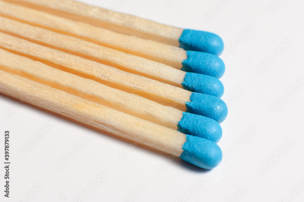 Blue matches on a white background