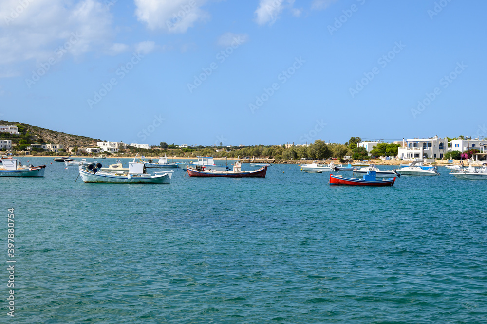 Fishing boats in Aliki harbor. Aliki is beautiful coastal village with a picturesque port on Paros Island. Cyclades, Greece