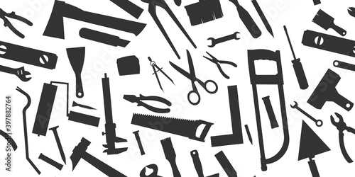 Construction tools. Background. For work as a painter, carpenter, builder, handyman. Repair and construction services. Sale of tools. Monochrome silhouette.