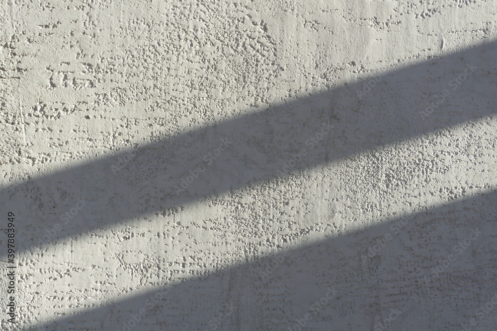 Fototapeta premium Shadows on the gray concrete wall from the sun. Shadow background..
