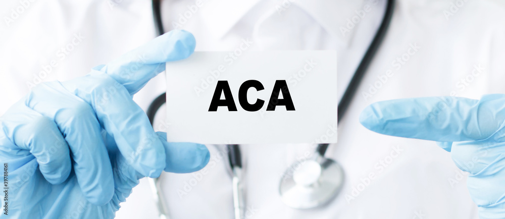 doctor's hands in gloves hold a card with the word ACA -affordable care act. Medical concept. doctor's hands in gloves hold a card with the word ACA -affordable care act. Medical concept.