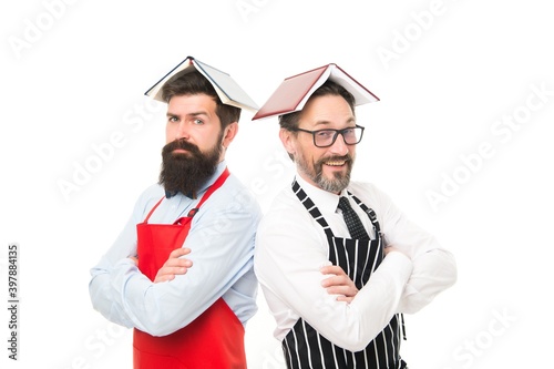 I love my job. housewife men cooking. Culinary ingredient. menu planning. happy chef team in apron. bearded men with recipe book. cafe and restaurant opening. catering business. seating plan