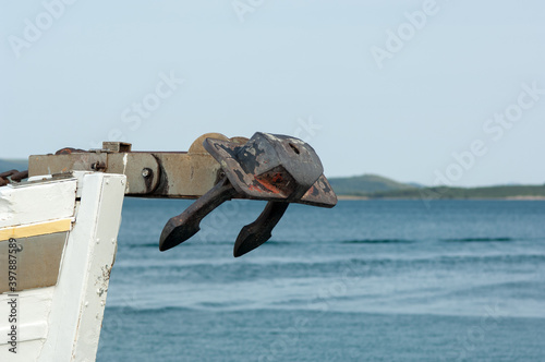 Ship fore with raised anchor photo