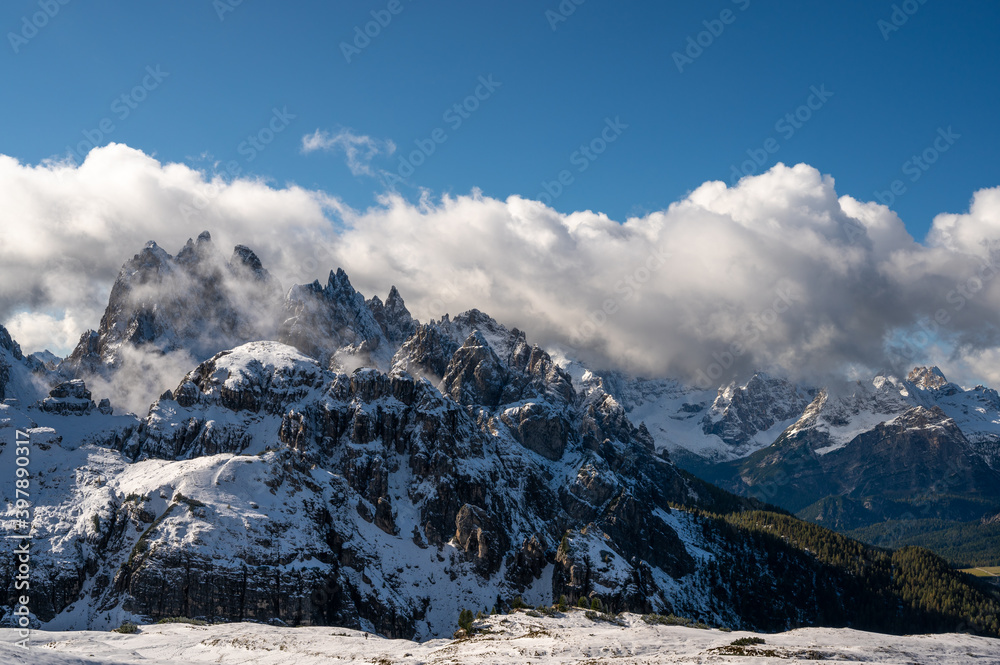 First snow in the Italian dolomites during autumn. World heritage in South Tyrol in Italy.