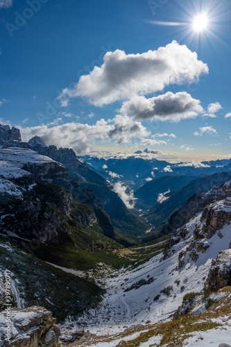 First snow in the Italian dolomites during autumn. World heritage in South Tyrol in Italy, sunny day.