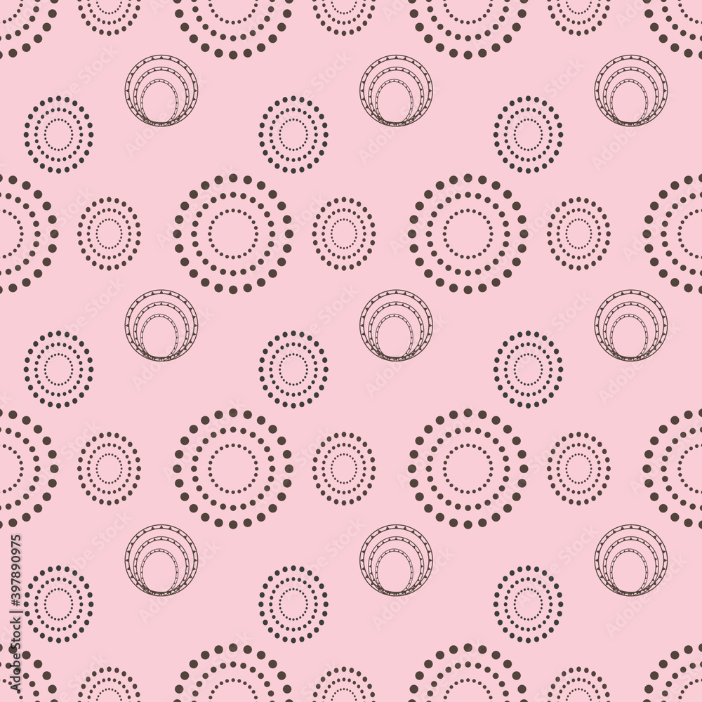 large and small circles on a pink background large and small circles on a pink background