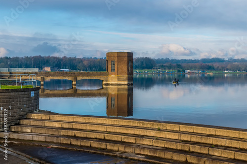 A view across the overflow towards the waters of Pitsford Reservoir, UK in winter