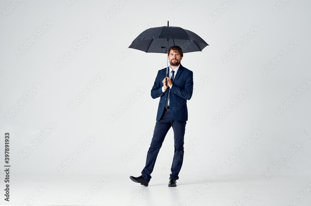 man with open mouth classic suit model in full growth on a light background man with open mouth classic suit model in full growth on a light background