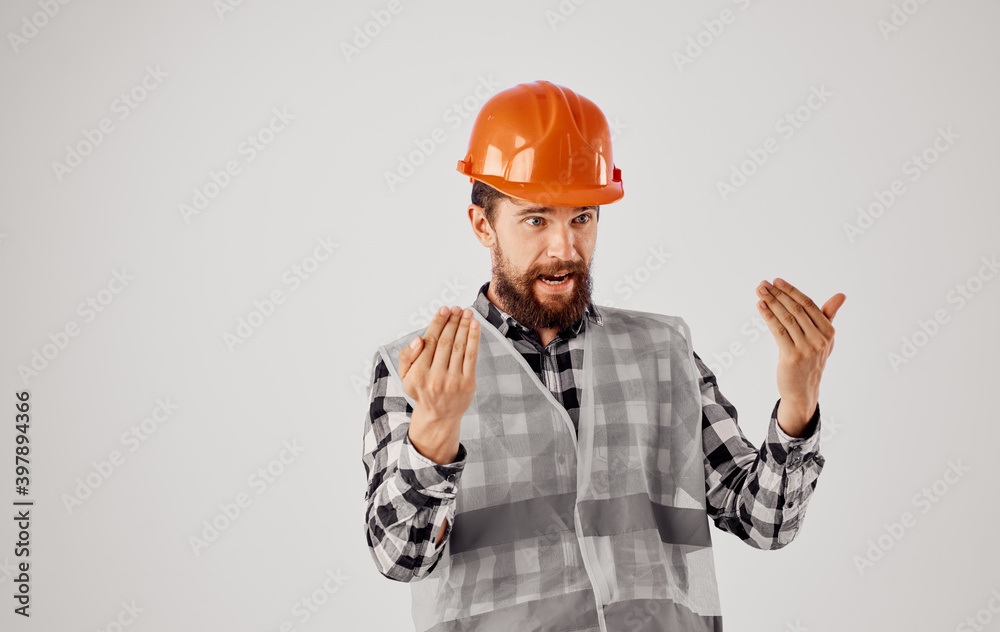 man in working uniform orange helmet construction work man in working uniform orange helmet construction work