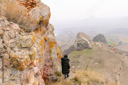 Female Tourist walking around fortress photo