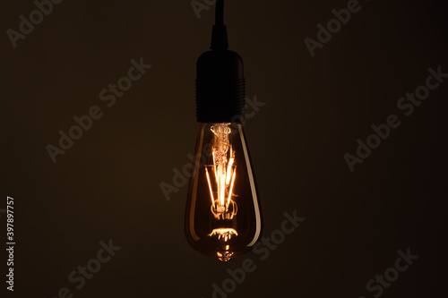 Vintage lightbulb on dark background