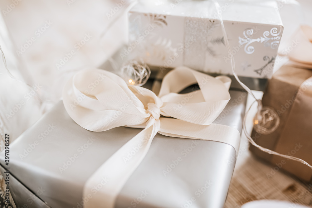 New Year gifts and Christmas toys on wooden floor New Year gifts and Christmas toys on wooden floor