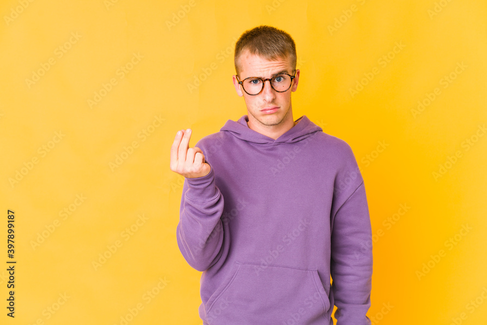 Young caucasian handsome man showing that she has no money. Young caucasian handsome man showing that she has no money.
