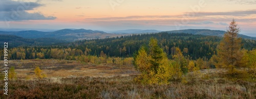 View from the top of Houpák with large heath lands, target impact area Jordán in former military area, PLA Brdy (CHKO Brdy), photographed at blue hour after sunset, in autumn color