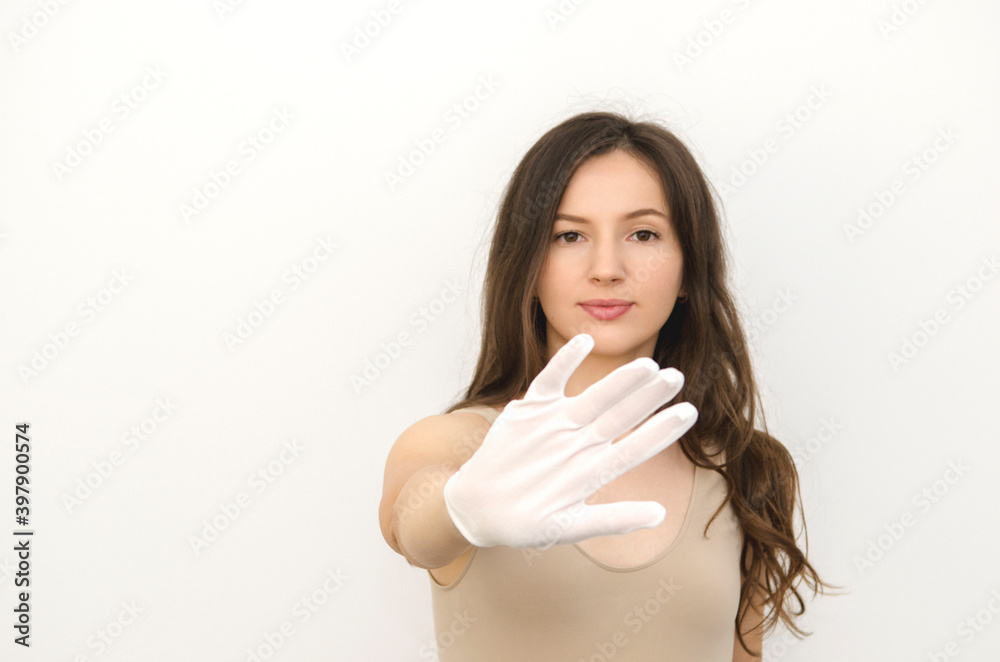 young beautiful woman wearing a white glove young beautiful woman wearing a white glove